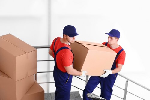 Unpacking boxes and organising rooms in a new Finsbury Park property