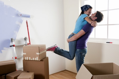 Packed boxes and moving van prepared for a home move