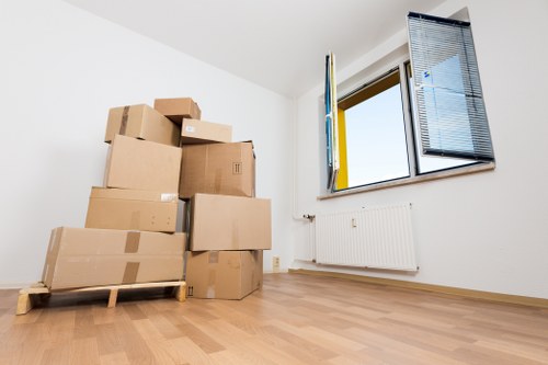 Local team handling furniture and stock on a commercial relocation