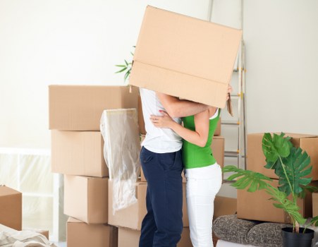 Removal van and boxes ready for a home move in Finsbury Park