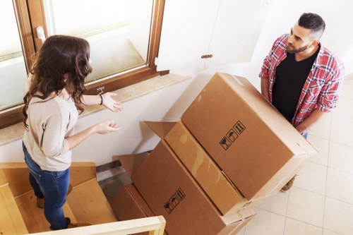 Furniture and boxes being loaded for a removal truck hire booking