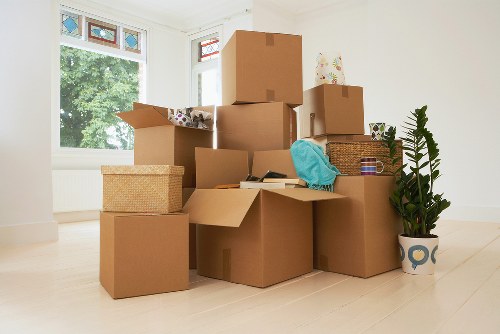 Loading household items into a removals van in North London
