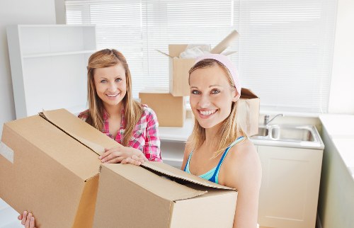 Moving boxes and wrapped household items prepared for transport