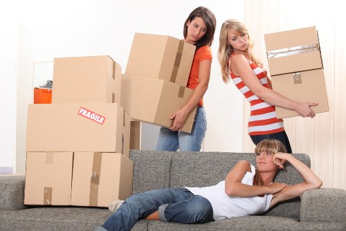 Packed boxes and dismantled office furniture ready for transport