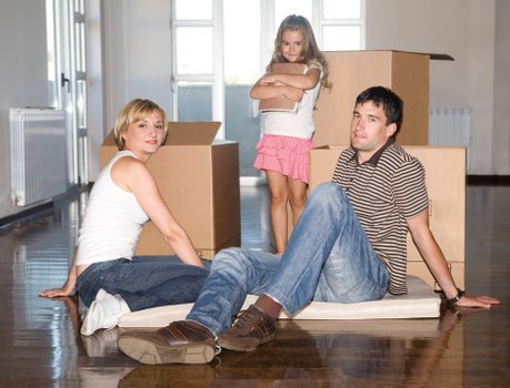A family moving home with help from a local removals team